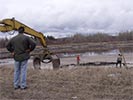 Moose rescue excavator with grapple arrives