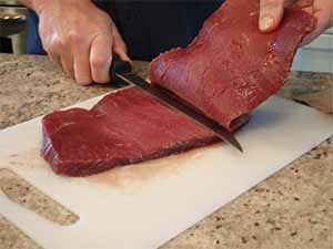 Slicing Moose Round Steak