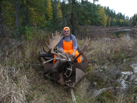 Hunter with his moose