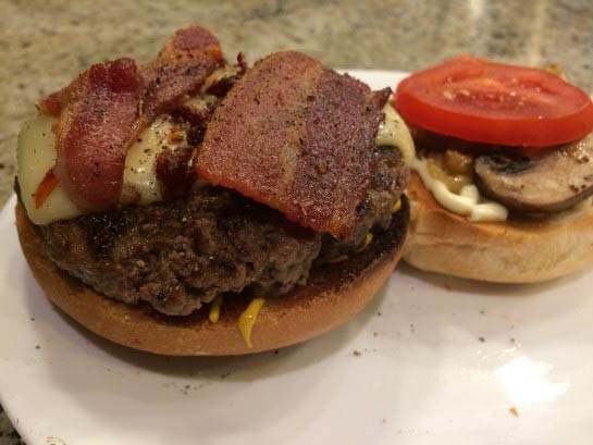 Gourmet Moose Hamburger Sandwich Topped with Danish Fontina Cheese